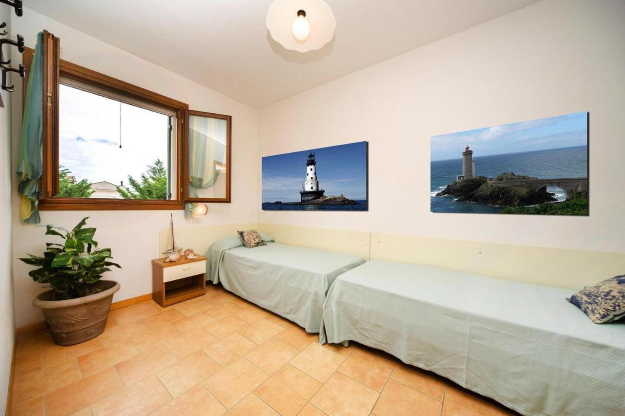 Terraced House In The Ca' Del Pino Holiday Complex With Communal Pool In Bibione Eksteriør billede